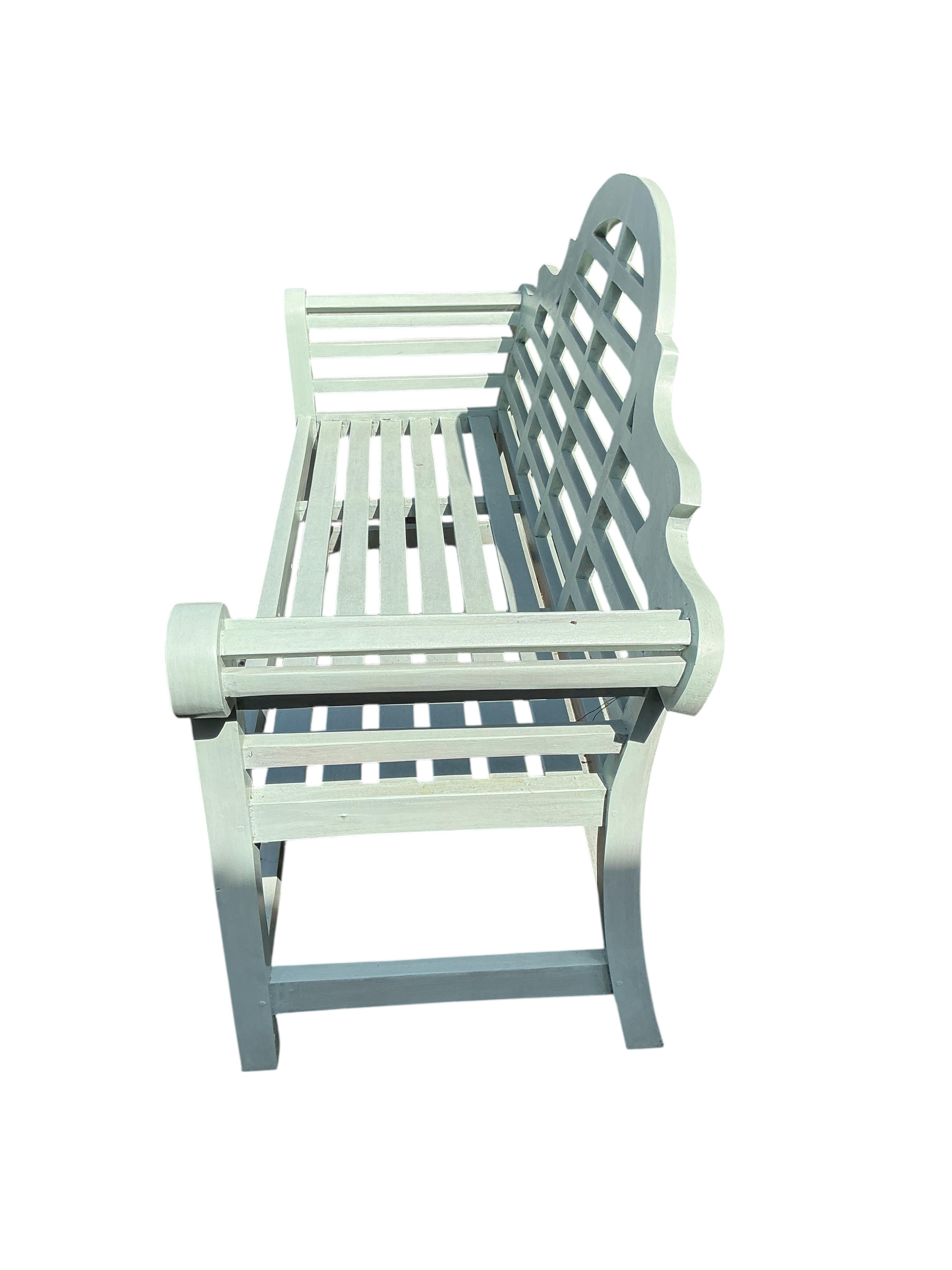 A Lutyens style teak garden bench, later painted, width 168cm, depth 52cm, height 105cm